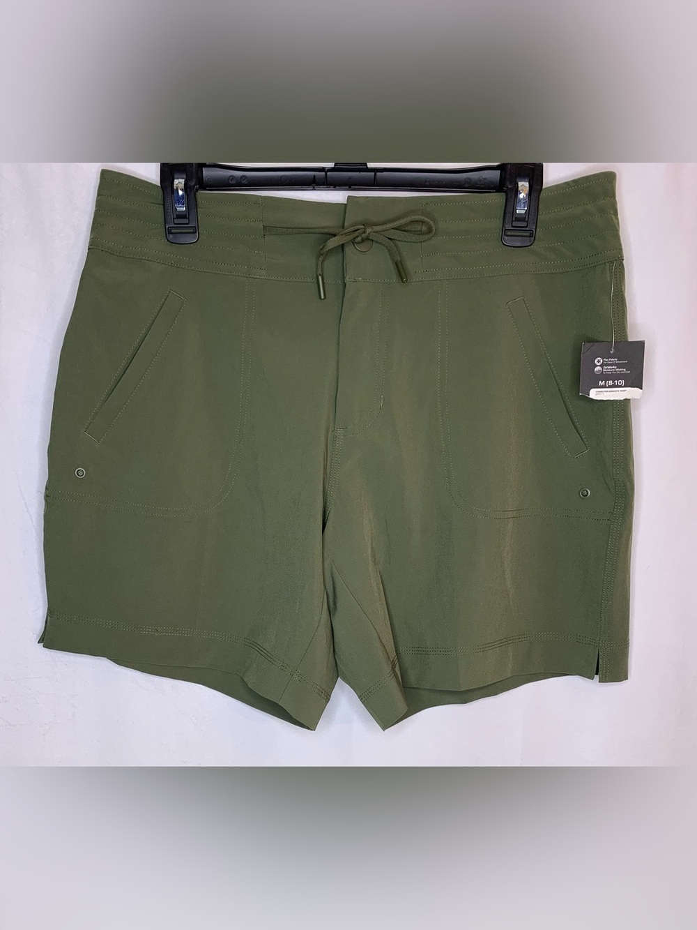 Women’s athletic works green commuter Bermuda shorts size Medium 8/10 NWT